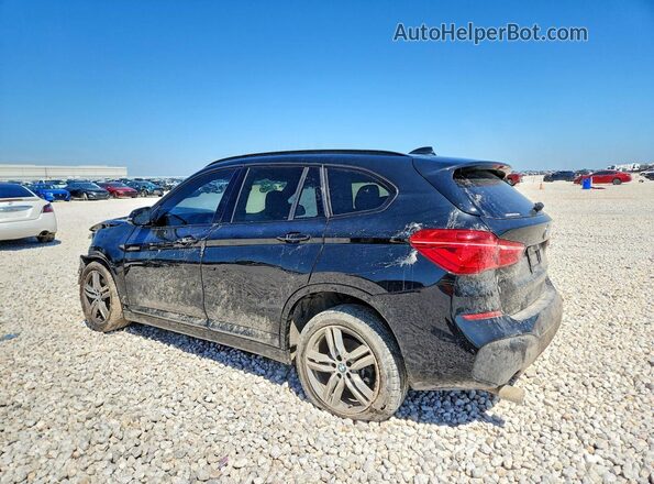 WBXHT3C38H5F79776 2017 BMW X1 Black Tył lewy