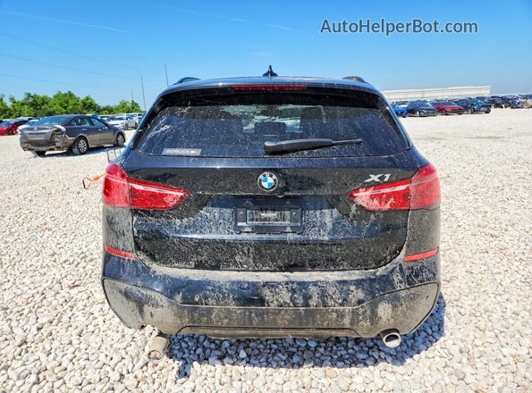 WBXHT3C38H5F79776 2017 BMW X1 Black Widok z tyłu