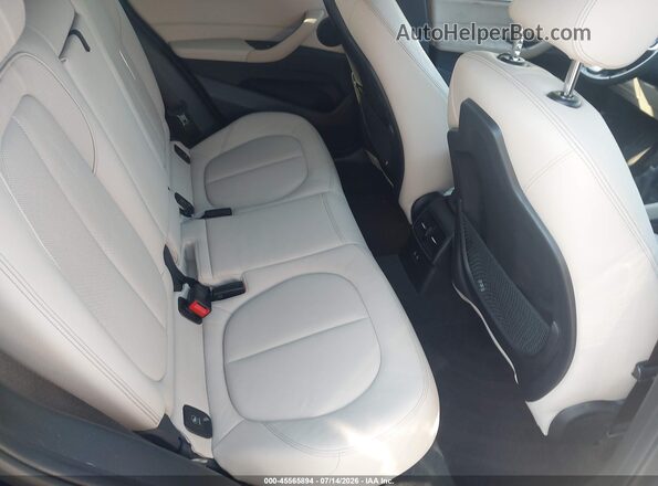 WBXHT3C38J3H30584 2018 BMW X1 Blue Вид наклейки з VIN-кодом