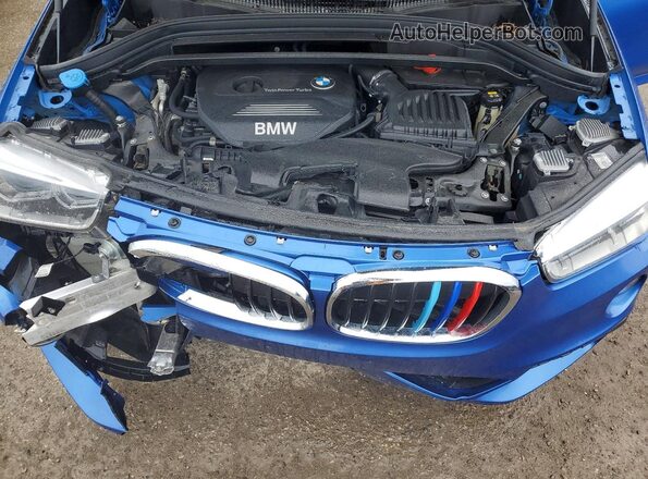 WBXHT3C38J5L31062 2018 BMW X1 Blue ძრავის განყოფილების ხედი