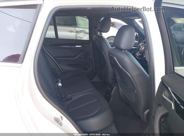 WBXHT3C39G5E47320 2016 BMW X1 White VIN კოდის სტიკერის ხედი