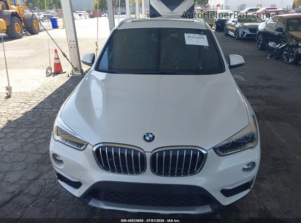WBXHT3C39G5E47320 2016 BMW X1 White ხელსაწყოთა პანელის ხედი