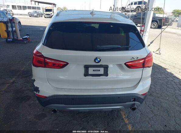 WBXHT3C39G5E47320 2016 BMW X1 White 