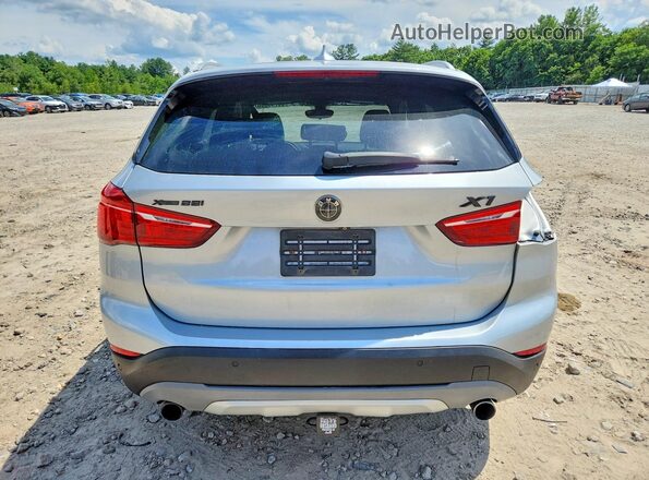 WBXHT3C39G5E48872 2016 BMW X1 Silver Հետևի տեսք