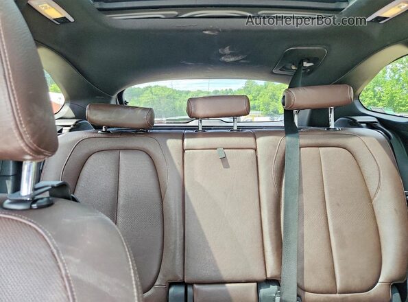 WBXHT3C39G5E48872 2016 BMW X1 Silver Հետևի նստատեղերի տեսք