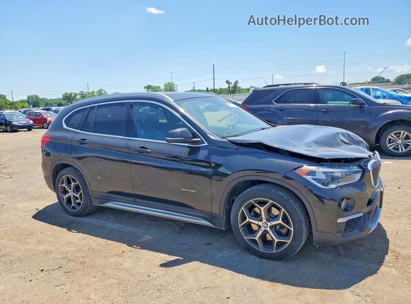 WBXHT3C39G5E51769 2016 BMW X1 Черный Передняя правая четверть