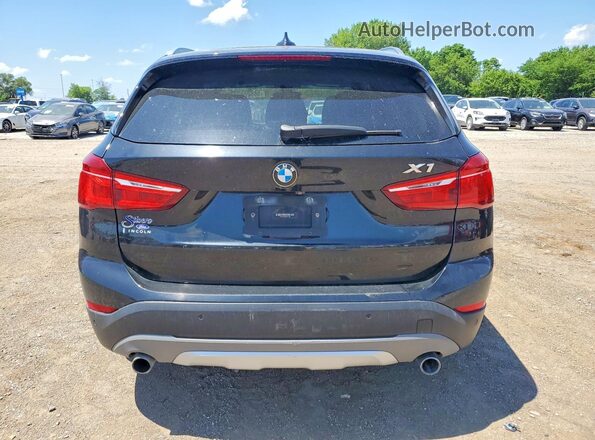 WBXHT3C39G5E51769 2016 BMW X1 Черный Вид сзади