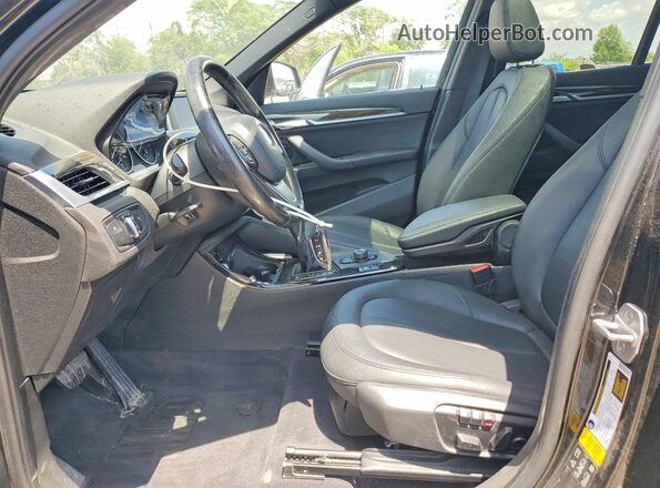 WBXHT3C39G5E51769 2016 BMW X1 Черный Вид салона спереди