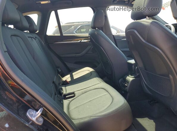 WBXHT3C39G5E51769 2016 BMW X1 Черный Вид задней части салона