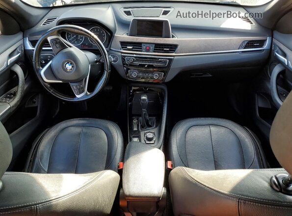 WBXHT3C39G5E54994 2016 BMW X1 Black Dashboard view