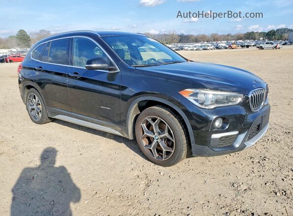 WBXHT3C39G5E54994 2016 BMW X1 Black Front right