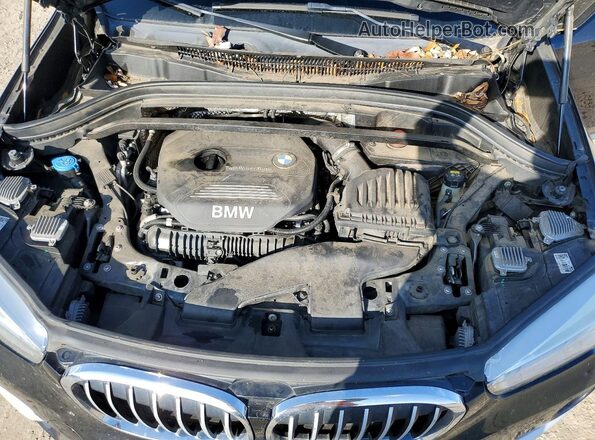 WBXHT3C39G5E54994 2016 BMW X1 Black Rear interior view