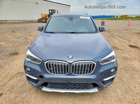 WBXHT3C39G5F63651 2016 BMW X1 Blue Vista frontal