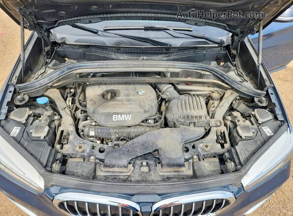 WBXHT3C39G5F63651 2016 BMW X1 Blue Vista del compartimento del motor