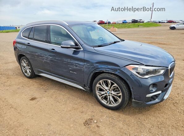 WBXHT3C39G5F63651 2016 BMW X1 Blue Delantero derecho