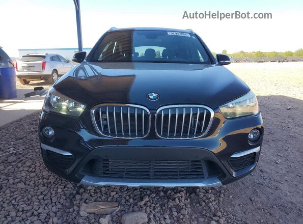 WBXHT3C39GP882128 2016 BMW X1 Black Դիմացի տեսք