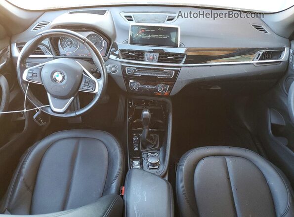 WBXHT3C39GP882128 2016 BMW X1 Black Առջևի վահանակի տեսք