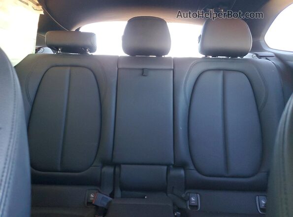 WBXHT3C39GP882128 2016 BMW X1 Black Հետևի նստատեղերի տեսք