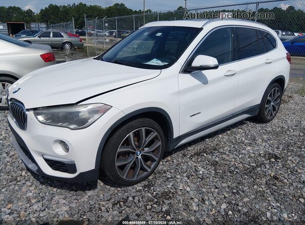 WBXHT3C39GP882484 2016 BMW X1 White Front left