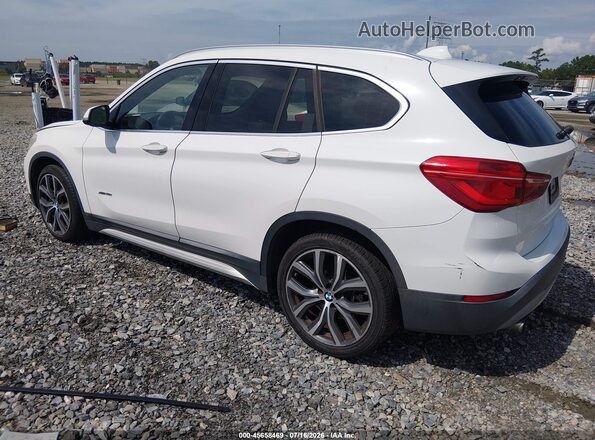 WBXHT3C39GP882484 2016 BMW X1 White Rear left