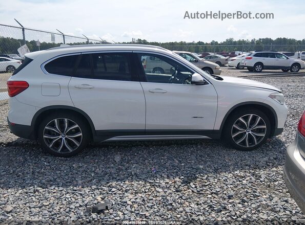 WBXHT3C39GP882484 2016 BMW X1 White Rear interior view