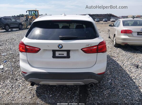 WBXHT3C39GP882484 2016 BMW X1 White 