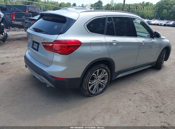 WBXHT3C39H5F68026 2017 BMW X1 Silver Trasero derecho