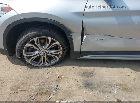 WBXHT3C39H5F68026 2017 BMW X1 Silver Vista frontal