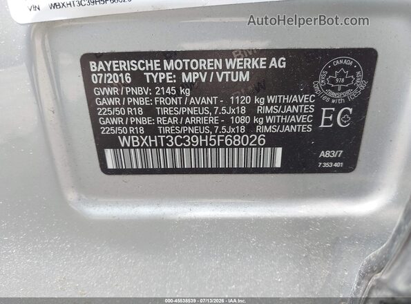 WBXHT3C39H5F68026 2017 BMW X1 Silver Vista del compartimento del motor