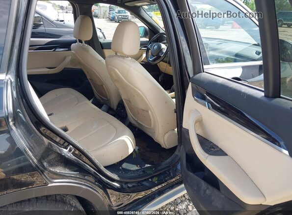WBXHT3C39J5F88198 2018 BMW X1 Black VIN կոդի պիտակի տեսք