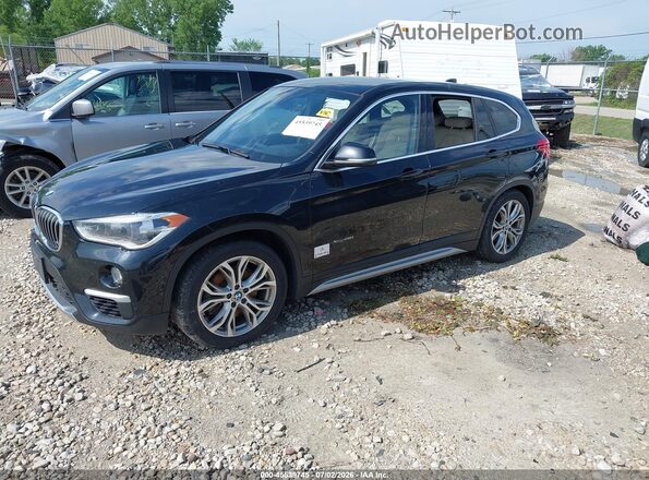 WBXHT3C39J5F88198 2018 BMW X1 Black Առջևի ձախ երեք քառորդ տեսարան