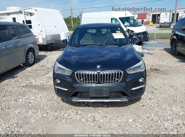 WBXHT3C39J5F88198 2018 BMW X1 Black Սարքավորումների վահանակի տեսք