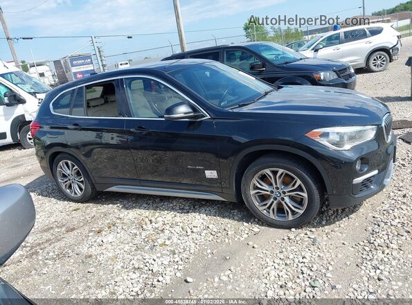 WBXHT3C39J5F88198 2018 BMW X1 Black Սալոնի հետևի տեսք