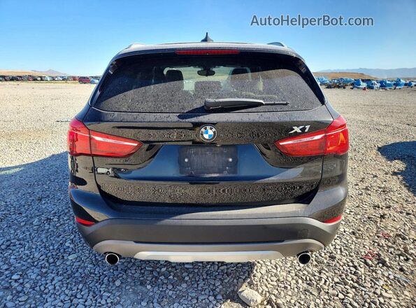 WBXHT3C39J5F92199 2018 BMW X1 Черный Вид сзади