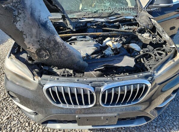 WBXHT3C39J5F92199 2018 BMW X1 Черный Вид задней части салона