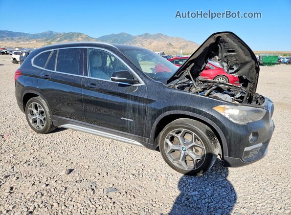 WBXHT3C39J5F92199 2018 BMW X1 Черный Передняя правая четверть