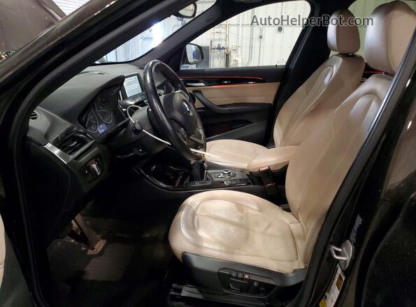 WBXHT3C3XGP883983 2016 BMW X1 Brown Front interior view