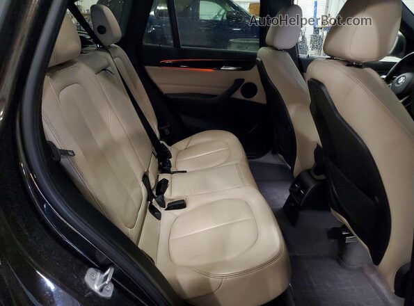 WBXHT3C3XGP883983 2016 BMW X1 Brown Rear interior view