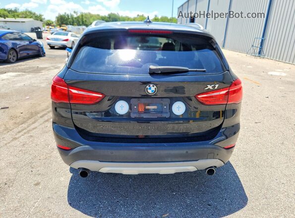 WBXHT3C3XGP884728 2016 BMW X1 Black უკანა ხედი