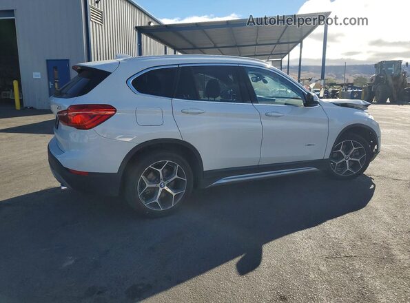 WBXHT3C3XH5F68231 2017 BMW X1 White Trasero derecho
