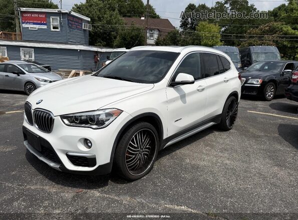 WBXHT3C3XH5F87619 2017 BMW X1 White წინა მარცხენა ხედი სამი მეოთხედიდან