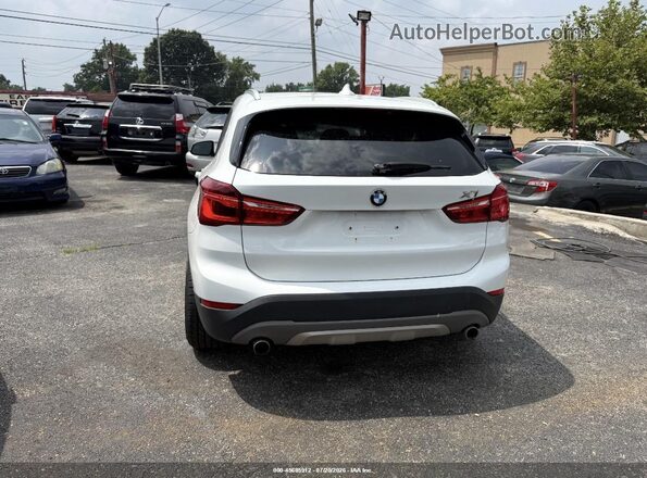 WBXHT3C3XH5F87619 2017 BMW X1 White ხელსაწყოთა პანელის ხედი