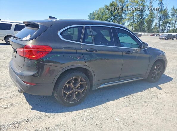 WBXHT3C3XJ3H30621 2018 BMW X1 Green Rear right
