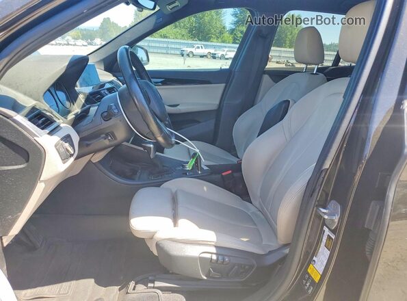 WBXHT3C3XJ3H30621 2018 BMW X1 Green Front interior view
