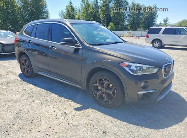 WBXHT3C3XJ3H30621 2018 BMW X1 Green Front right