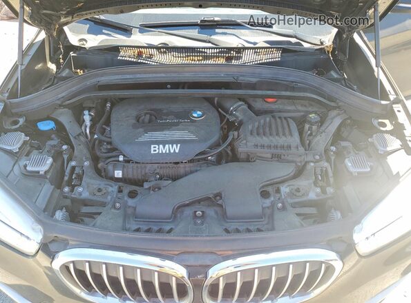 WBXHT3C3XJ3H30621 2018 BMW X1 Green Engine compartment view