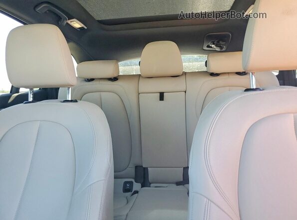 WBXHT3C3XJ3H30621 2018 BMW X1 Green Rear seats view