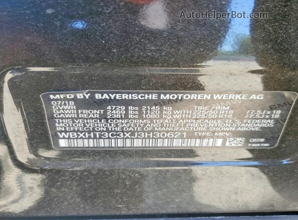 WBXHT3C3XJ3H30621 2018 BMW X1 Green VIN sticker view
