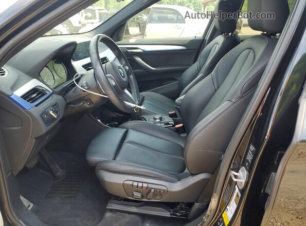 WBXHT3C51K5N00387 2019 BMW X1 Black Widok wnętrza z przodu