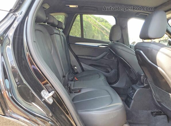 WBXHT3C51K5N00387 2019 BMW X1 Black Widok tylnych siedzeń